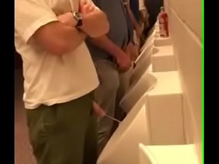 Pissing bro at the ballgame urinal